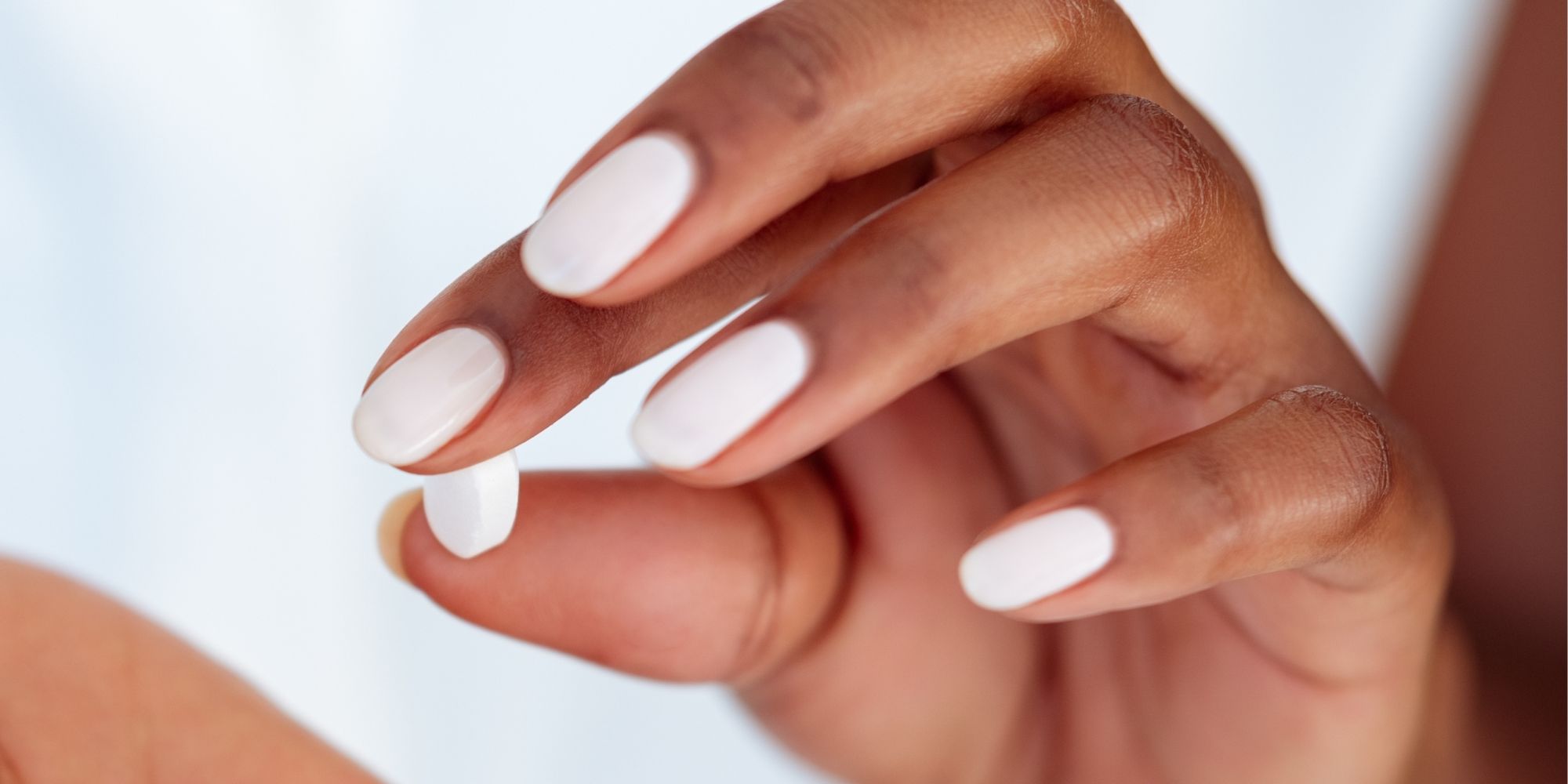 teenage girl looking at laptop